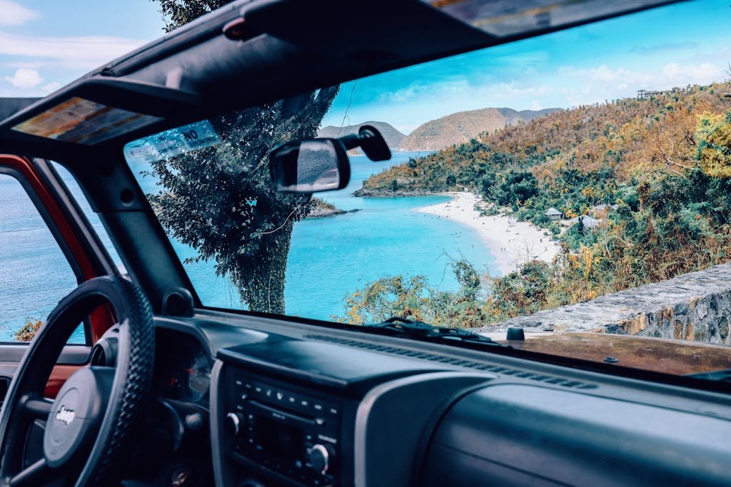 Enjoy the breathtaking beach view from a convertible on St John, U.S. Virgin Islands.