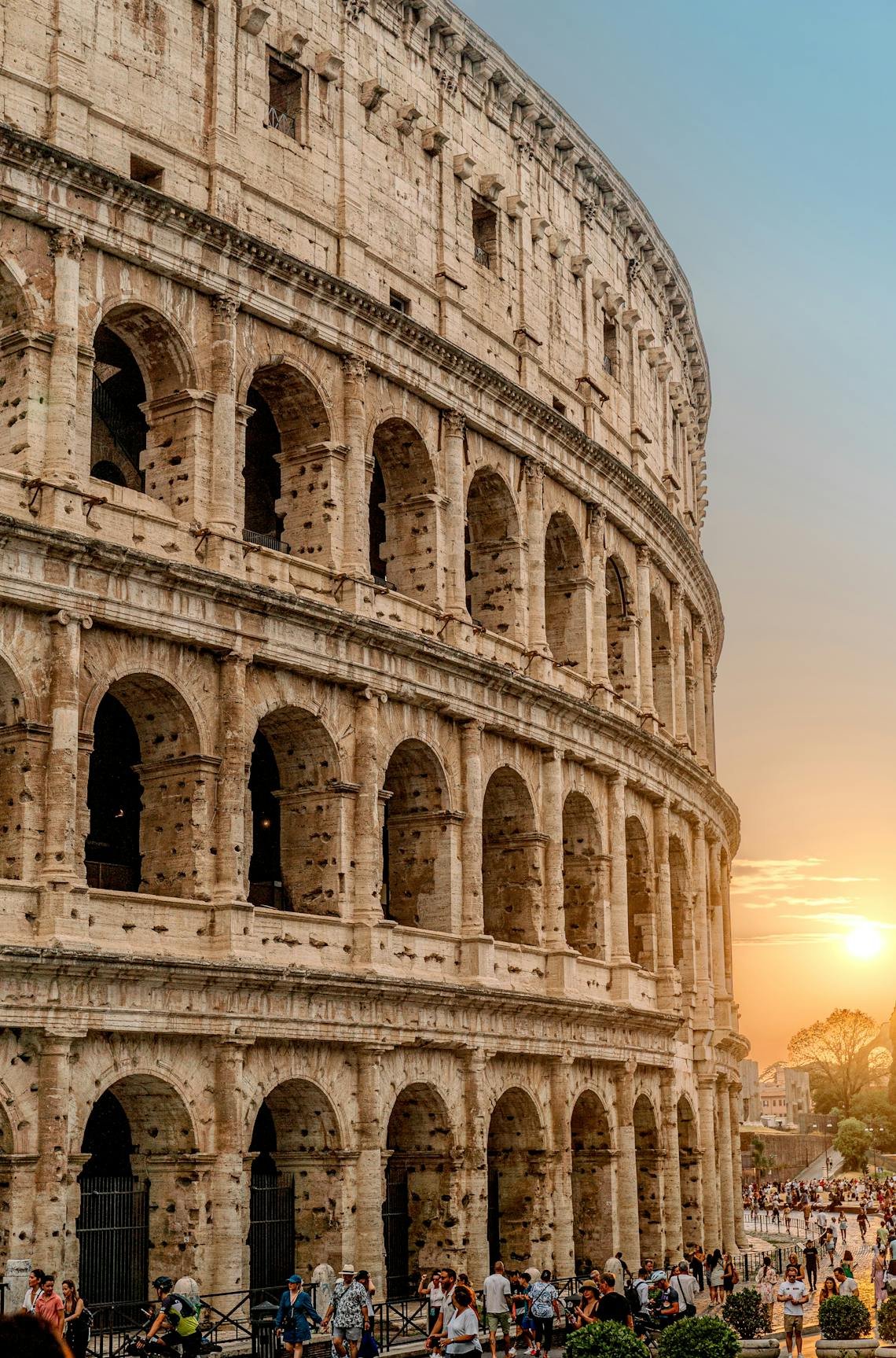 A stunning view of the Roman Colosseum at sunset, capturing the essence of historic Rome.