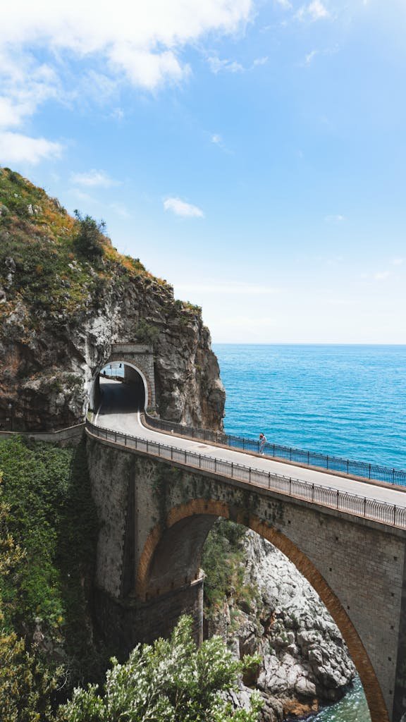 Beautiful shot of the Fiordo di Furore bridge overlooking the turquoise sea along Italy's Amalfi Coast.