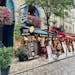 Explore Paris' charm with historic buildings and outdoor cafes.