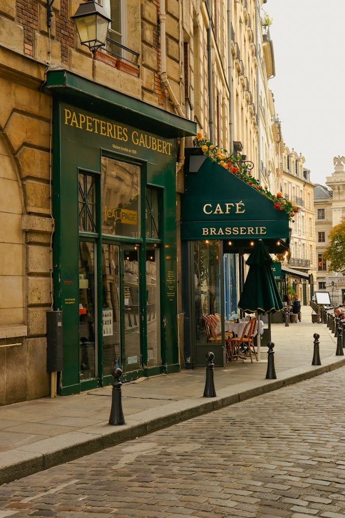 Explore the quaint streets of Paris with picturesque cafés and historic architecture.