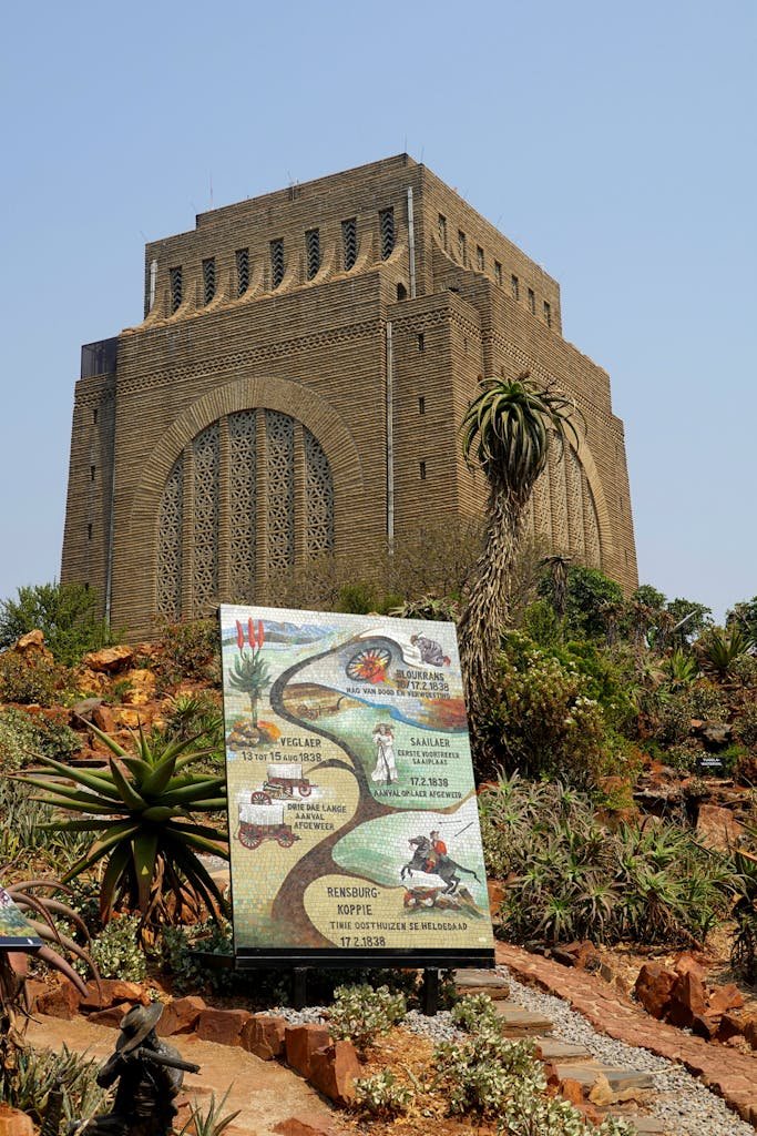 Historic Voortrekker Monument surrounded by lush flora in Pretoria, South Africa.
