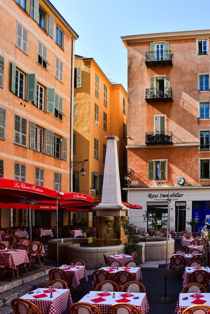Picturesque café terrace in Provence, France, featuring traditional architecture and cozy ambiance.