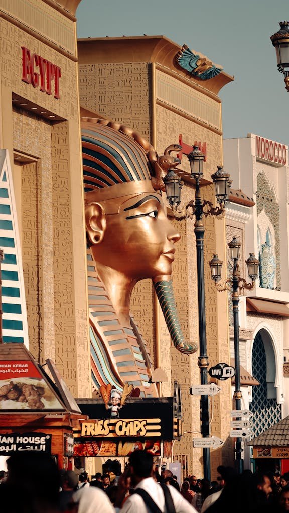 Stunning Pharaoh head sculpture at Global Village in Dubai, UAE, displaying Egyptian architectural theme.