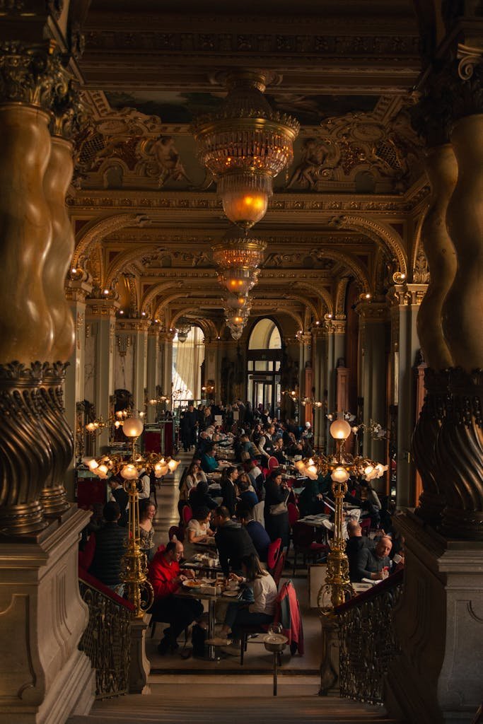 Stunning view of the opulent New York Cafe in Budapest featuring ornate decor and bustling patrons.